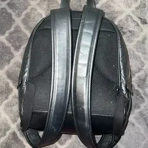 Gucci | Bags | Black Gucci Embossed Leather Mini Backpack  display picture 1